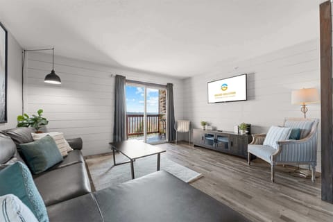 Curl up in the airy living room & stream your favorites on the smart TV​