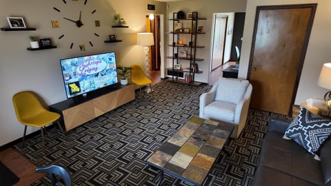 Cozy living room with stylish decor and vibrant accents