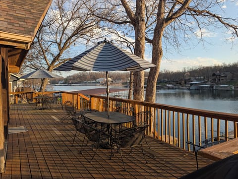 Full length wood deck• Overlooks private cove 