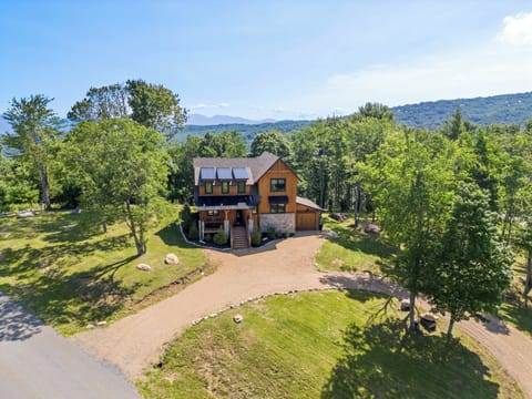 Perched above the trees with mountain ridges stretching to the horizon, Safe Haven At Eagles Nest makes a stunning first impression.