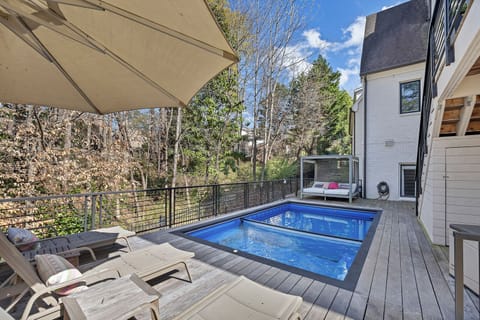 Private patio w/ plunge pool & outdoor seating, a refreshing spot to unwind in the fresh air