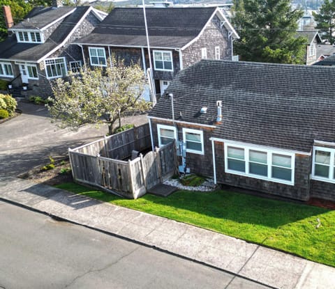 Charming coastal cottage with private yard and peaceful neighborhood setting, perfect for a relaxing seaside getaway.