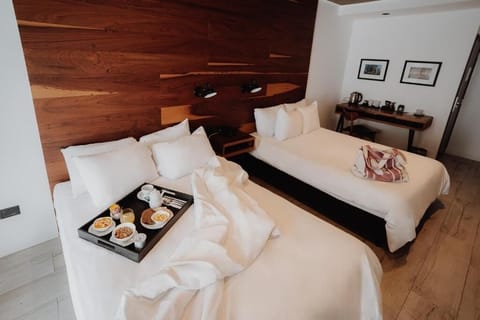 Wake up slowly with breakfast in bed and plush linens.