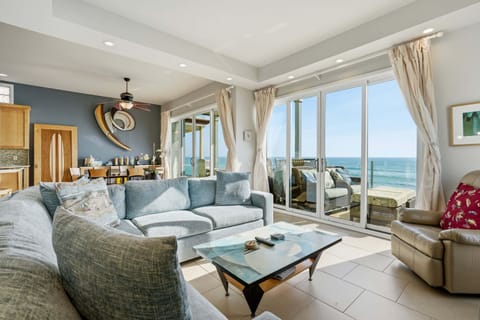 Oceanfront living room with panoramic views