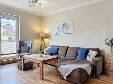 Furniture, Interior Design, Floor, Flooring, Couch, Wall, Living Room, Wood, Wood Flooring, Room
