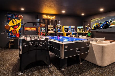 Step into The Hangout — your private arcade lounge for your stay.