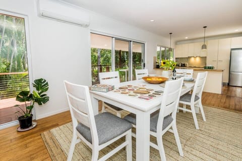 Spacious kitchen and dining area with natural light and garden views—ideal for family meals and gatherings.
