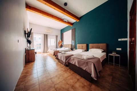 Family Room, Balcony | Iron/ironing board, free WiFi