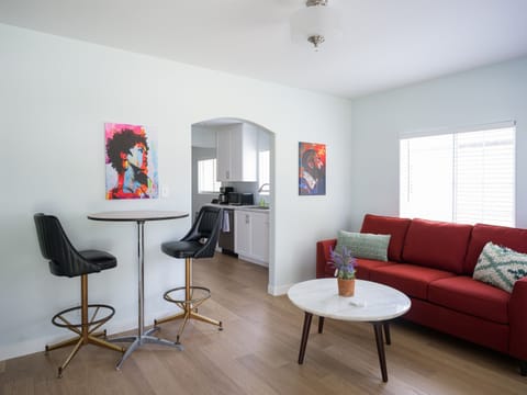 Living room leads into kitchen so you can eat and watch a movie