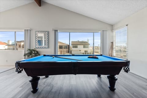 Slate pool table with blue felt for casual games anytime