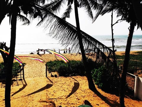 On the beach, 3 beach bars, surfing