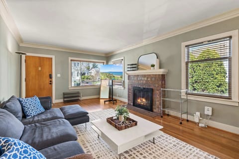 Unwind in a warm, inviting living space perfect for movie nights, good conversations, and quiet moments by the fire.