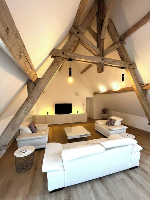 Deluxe Suite, Non Smoking, Garden View | Living area | TV