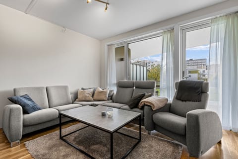 Comfortable living room with access to a terrace.