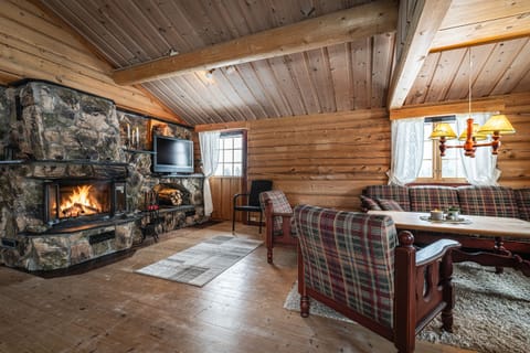 The cabin has a large open fireplace for that extra comfort