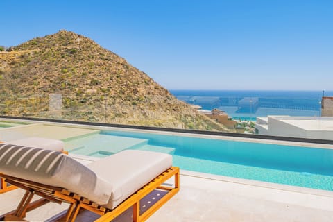 Private pool with stunning sea and mountain views overlooking the Mediterranean coastline.