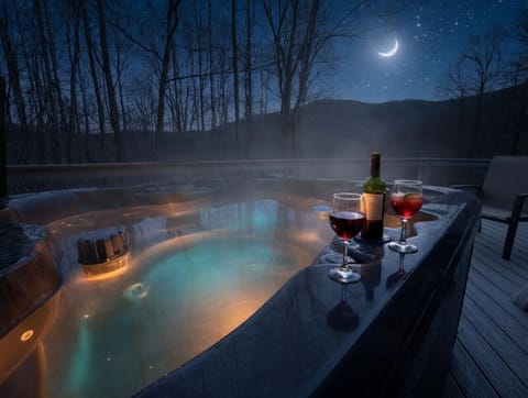 Hot Tub Oasis: Unwind under the stars with drinks in hand in this relaxing retreat!