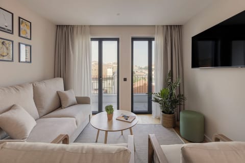 Duplex, 3 Bedrooms | Living area | 50-inch flat-screen TV with cable channels