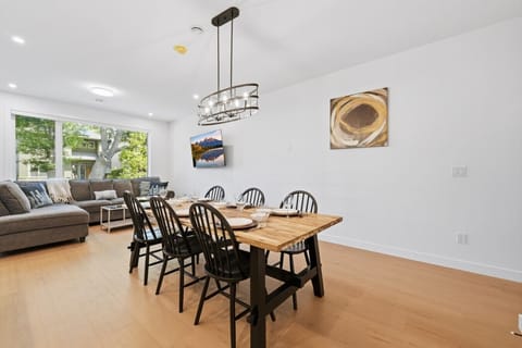Spacious main floor where the whole family can relax together, flooded with natural light.