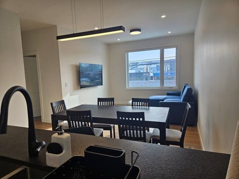Bright, open-concept living. The perfect space to gather for a meal or relax after a day of adventuring at nearby WinSport.