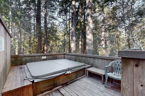 Soak under the stars in your private hot tub, surrounded by the whisper of the forest—perfect for a tranquil escape after a day of adventures.