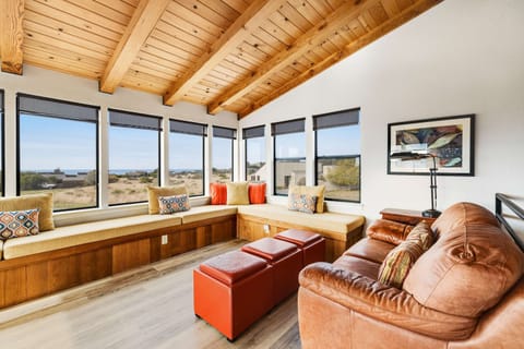 With panoramic views from every angle, this living room invites you to relax and enjoy the beauty of Sea Ranch.