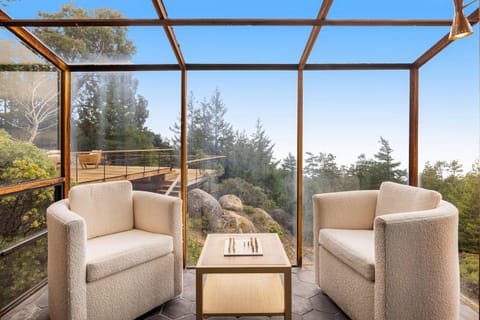 Sip your favorite drink in this serene outdoor space, where the gentle breeze and stunning vistas create a peaceful retreat.