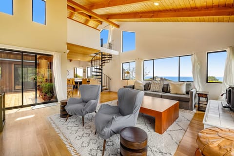 This open-concept living space blends comfort and style, making it an ideal spot for cozy evenings with family or friends.