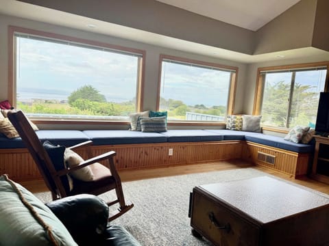 Settle into the window seat with your morning coffee — the ocean view does the rest.