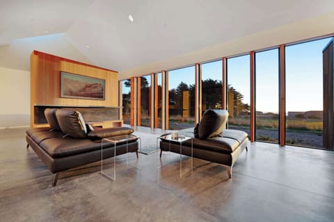 Morning light fills the living room, creating a perfect backdrop for leisurely afternoons spent with family and friends.