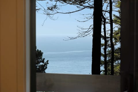 Gaze out at the breathtaking ocean view from this cozy nook, where every moment invites you to relax and soak in the beauty of nature.