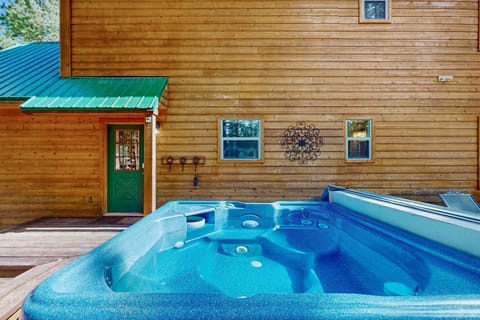 Sink into the private hot tub among the pines under the stars