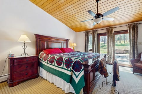 Unwind in the primary suite with a king bed and a dedicated workspace