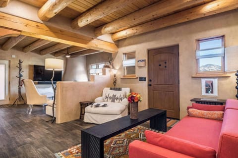 Settle in for movie night in the cozy, light-filled living room