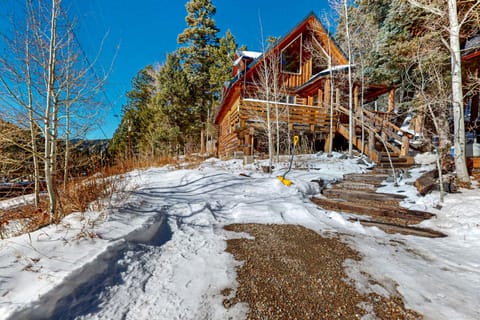Return to your log cabin tucked into the Taos Ski Valley forest