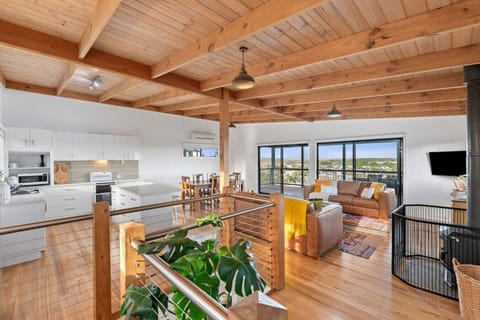 Open-plan living area filled with warmth and light