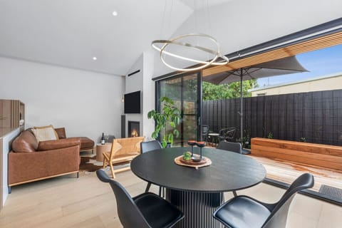 Stylish open living with a sunny private patio