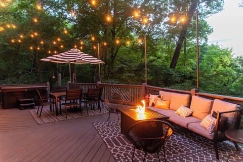 String lights and a cozy fire pit set the mood for evenings outdoors…