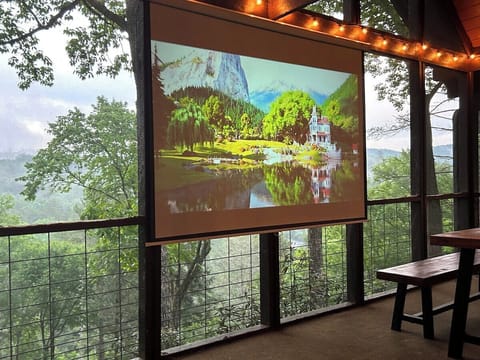 Enjoy an outdoor movie on the 100" projector screen with tons of movie options to choose from!