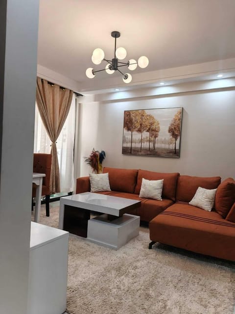 Business Apartment, City View | Living area | 32-inch Smart TV with digital channels