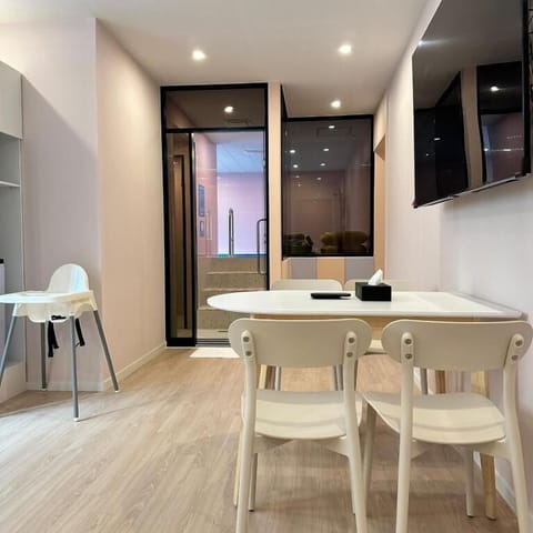 Family Room, City View | Dining