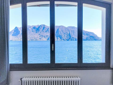 Water, Mountainous Landforms, Body Of Water, Furniture, Mountain, Coastal And Oceanic Landforms, Sea, Hill, Table, Mountain Range