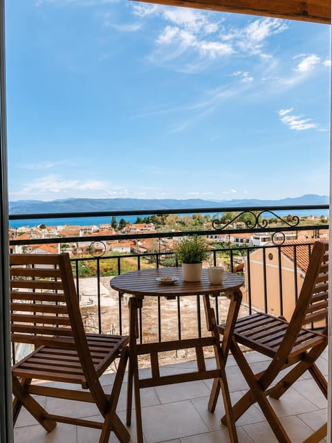 Private balcony with stunning sea views — perfect for breakfast or sunset drinks.