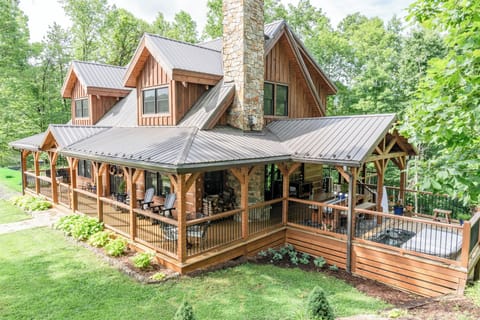 The wrap around porch has plenty of space for everyone to spread out and relax.