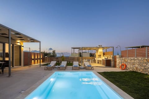 Relaxing nighttime pool with ambient lighting.