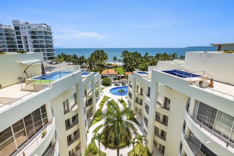 Enjoy sweeping ocean and resort views from this bright Nuevo Vallarta condo, perfectly located just steps from the beach and pool area.