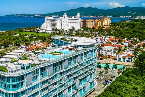 Take in breathtaking panoramic views of the resort, surrounding mountains, and sparkling coastline from this elevated perspective.