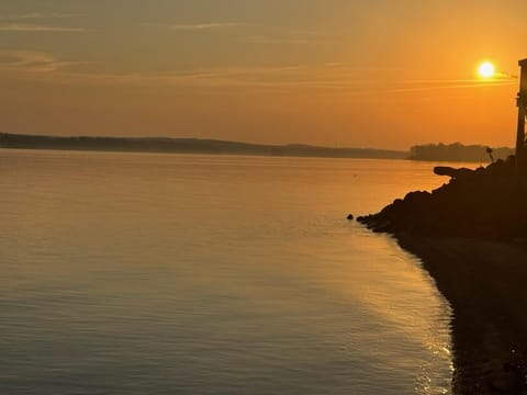 Wake up to breathtaking sunrise views over Lake Wateree