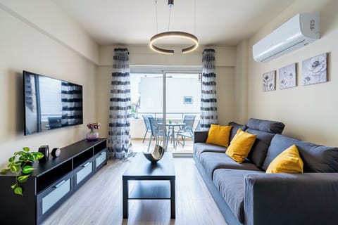 Apartment, 2 Bedrooms, Kitchen, City View | Living area | 50-inch Smart TV with digital channels, Netflix, streaming services