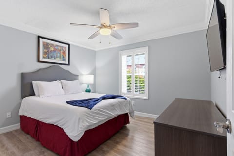 Soft, neutral queen bedroom designed for a peaceful night's sleep.
